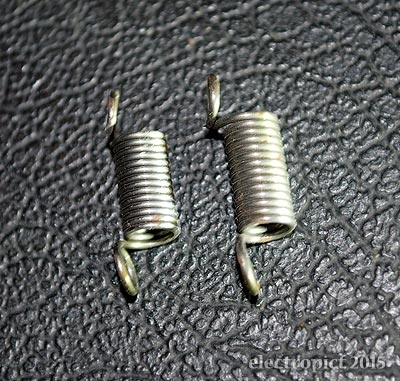 black (left) and white key-return springs